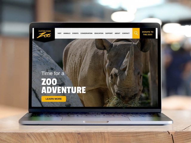 Potter Park Zoo Homepage on a laptop